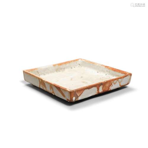 A square glazed stoneware dish