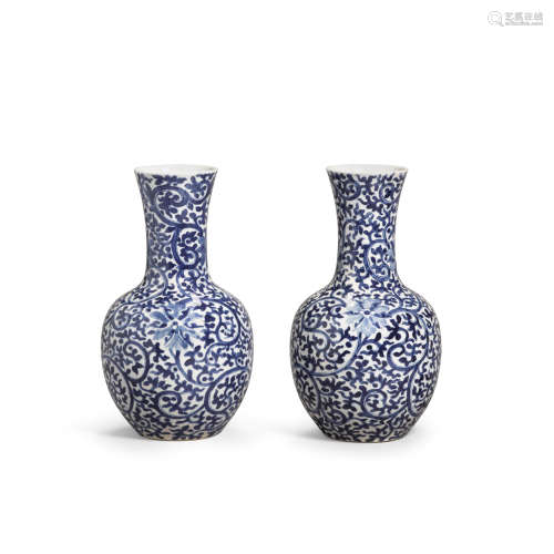 A PAIR OF BLUE AND WHITE SOFT PASTE PORCELAIN VASES