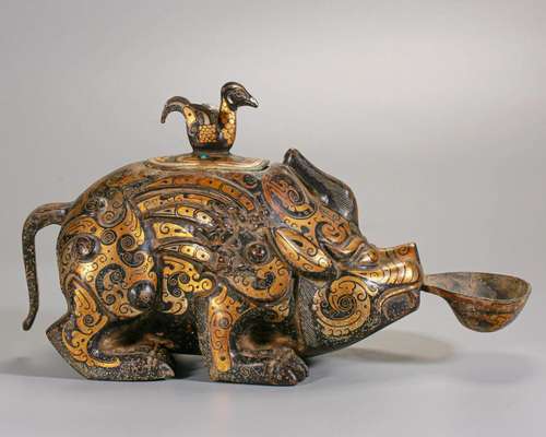 A Chinese Silver Inlaid Parcel Gilt Bronze Beast Han