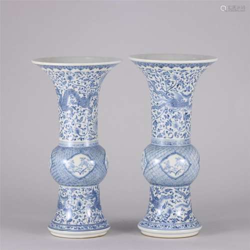 Pair of Blue and White Dragon Phoenix Gu Vases
