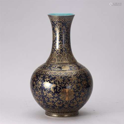 A Red Glaze Gold Painted Floral Vase