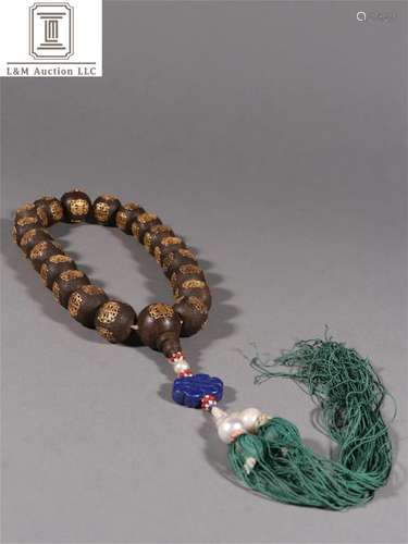 A Chinese Agarwood and Gilt Bronze 18 Beads Bracelet