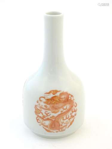 A Chinese bottle vase decorated with dragons and t…