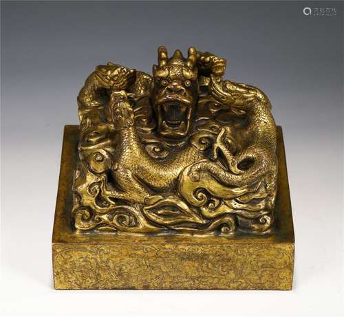 A Gilt Bronze Dragons Seal