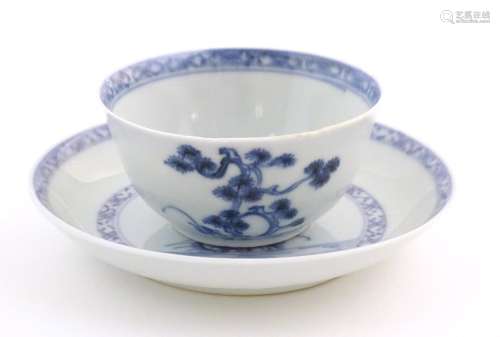 A Chinese Nanking Cargo blue and white tea bowl an…