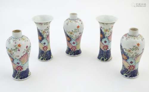 Five Chinese famille rose vases comprising two tru…