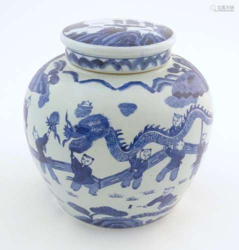 An Oriental blue and white ginger jar decorated wi…