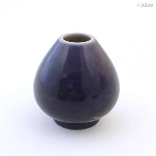 A small Chinese pot of teardrop form with an indig…