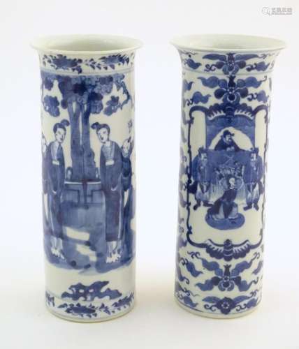 Two Oriental blue and white vases of cylindrical f…