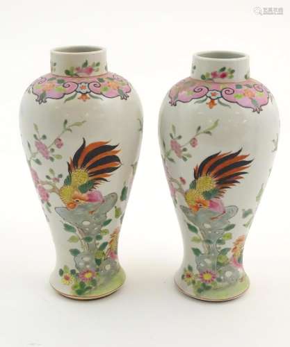 A pair of Chinese famille rose baluster vases deco…