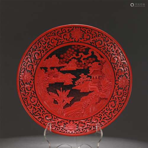 A Carved Red Lacquer Landscape Plate