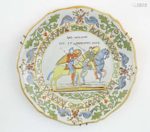A Continental faience plate depicting a scene from…