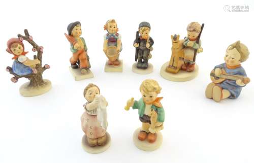 Eight Hummel / Goebel figures comprising Merry Wan…