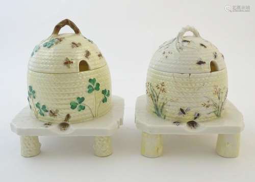 Two Belleek honey / preserve pots and covers forme…