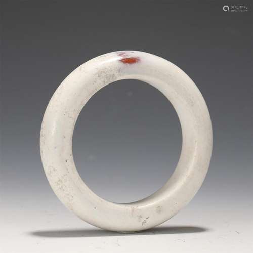 An Archaistic Style Jade Bangle