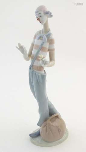 A Lladro figure, The Clown in Love model no. 6997.…