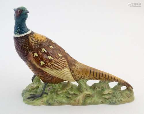 A Beswick model of a pheasant / game bird, model n…