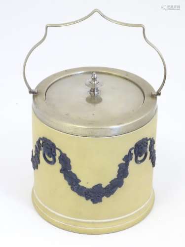 A Wedgwood biscuit barrel with a silver plate lid …