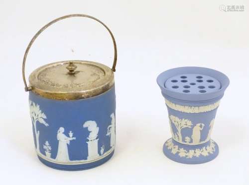 A Wedgwood jasperware biscuit barrel decorated wit…