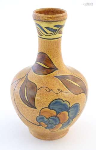 An Art Deco Clews & Co. Chameleon Ware bottle vase…