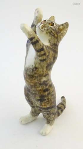A Winstanley model of a standing cat. Marked under…