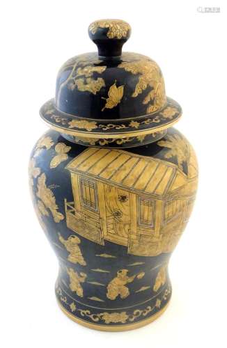 An Oriental black and ochre lidded ginger jar deco…