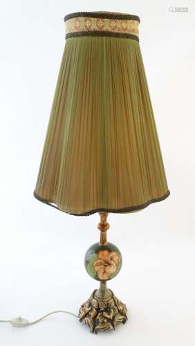 A Moorcroft table lamp with central spherical deta…