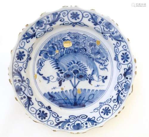 A Continental blue and white tin glazed charger wi…