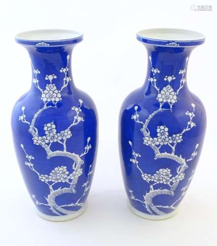 A pair of Oriental vases with a blue glaze decorat…