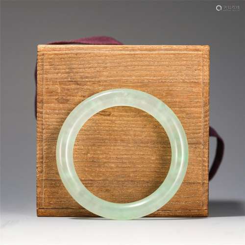 A Jadeite Carved Bangle