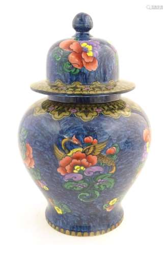 A Losol Ware lidded jar / vase of baluster form de…