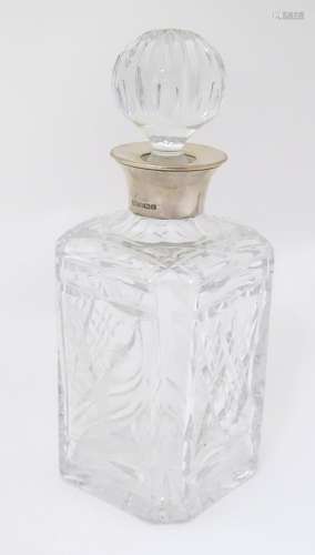 Golf Interest : A cut glass decanter with etched g…