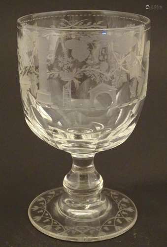 A 19thC glass rummer with etched decoration depict…