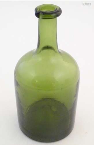 An olive glass bottle with spout to lip. 8 1/2" hi…