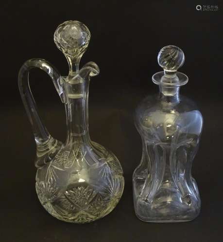 A 19thC pinched crystal decanter, the stopper with…