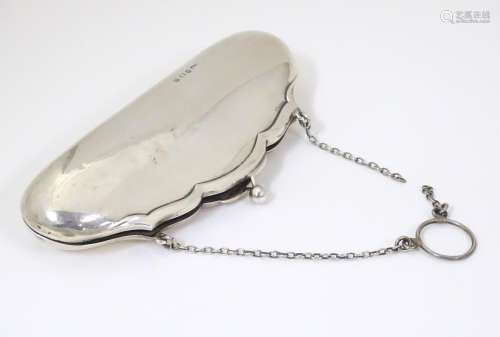 A silver purse hallmarked Birmingham 1913 maker B&…