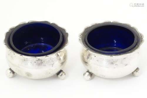 A pair of Victorian silver salts with blue glass l…