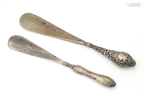 Two silver handled shoe horns, one hallmarked Ches…