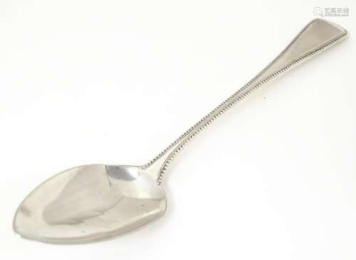 A silver table spoon hallmarked London 1803, maker…