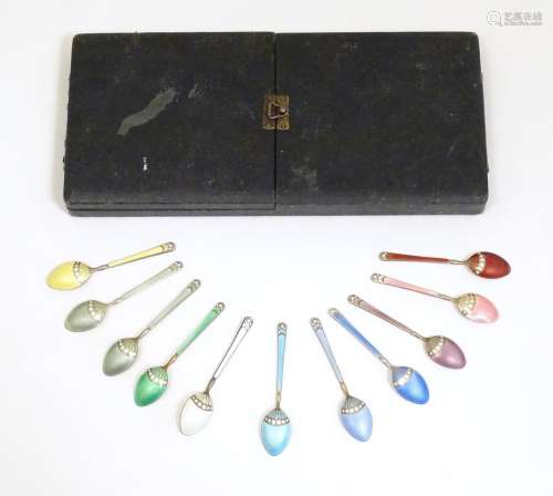 11 Art Deco silver teaspoons with guilloche enamel…