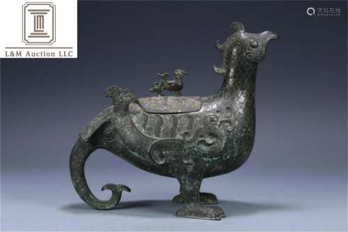 A Chinese Bronze Wine Container with Dragon