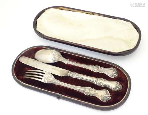 A silver Christening set comprising knife, fork an…