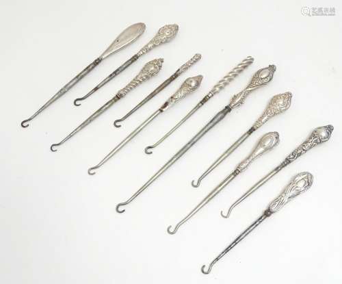 Eleven assorted silver handled button hooks, vario…