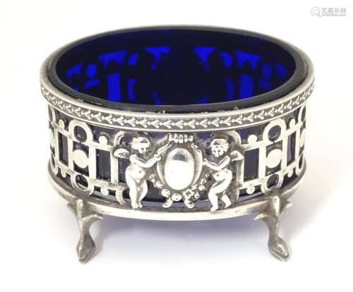 A Victorian silver salt with blue glass liner hall…
