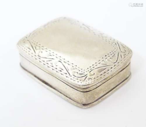 A .925 silver pill box with engraved decoration. A…