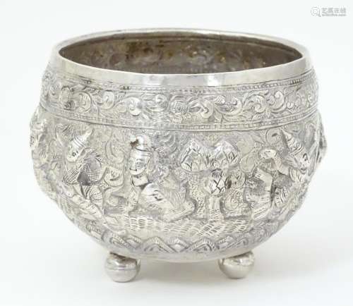 An Eastern white metal bowl with embossed figural …