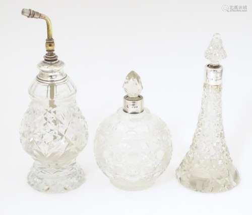 Three assorted silver mounted cut glass scent / pe…