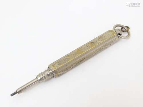 A silver plate propelling pencil with engraved det…