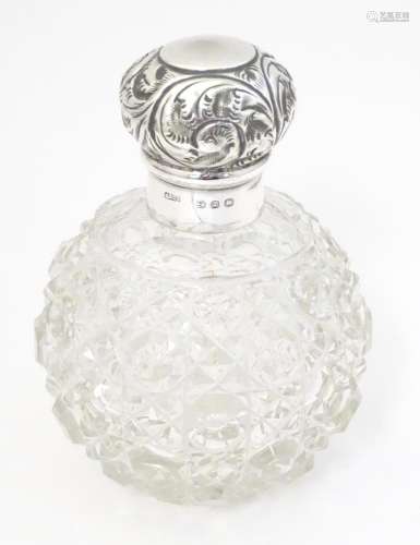 A Victorian cut glass scent / perfume bottle with …