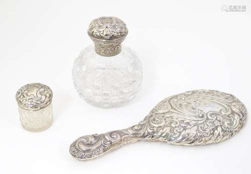 Three dressing table items comprising a silver bac…